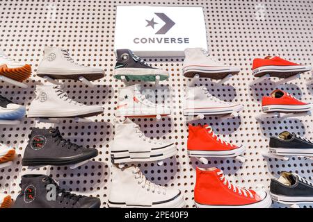 16 September 2022, Antalya, Turkiye: Famous trendy converse shoes for sale in fashion store Stock Photo