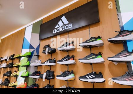 16 September 2022, Antalya, Turkiye: Adidas sportive shoes for sale at fitness store Stock Photo