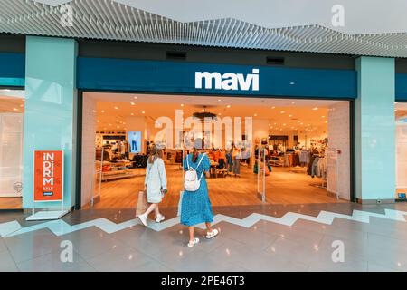 16 September 2022, Antalya, Turkiye: Famous chain fashion shop Mavi entrance with display Stock Photo