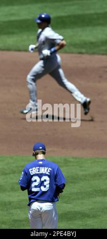 Texas Rangers Mark Teixeira runs out of the batters box after hitting a  double off of Cleveland Indians pitcher Cliff Lee that scored Alfonso  Soriano and Michael Young in the third inning