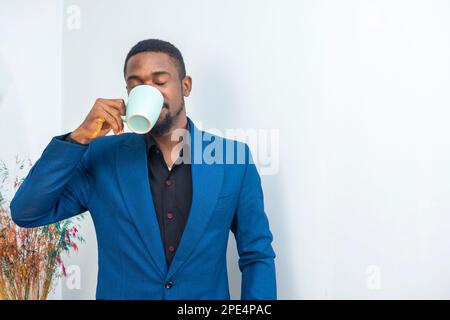 Photo of attractive business mature man well-dressed manager boss drinking morning coffee Stock Photo