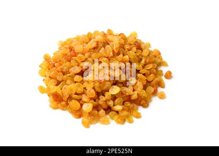 A handful of amber raisins on a white background, dry berries of light grapes on a white isolated. Stock Photo
