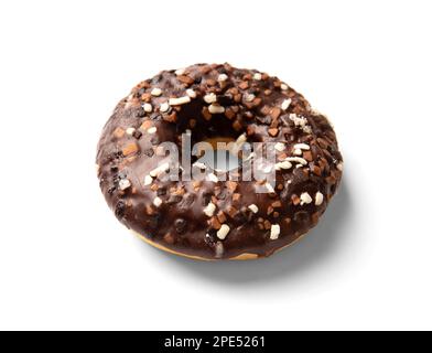 One donut in chocolate glaze sprinkled with pieces of white, milk and dark chocolate isolated on a white background. High-calorie junk food. Stock Photo