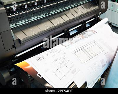 Large format plotter and printed drawings floor plans Stock Photo