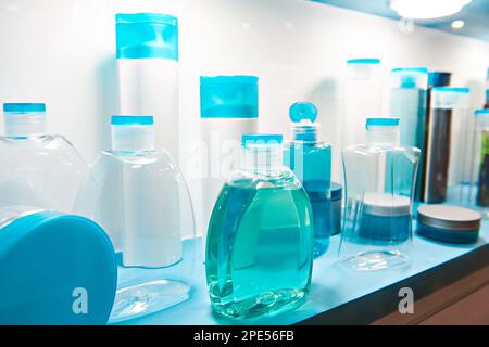 Showcase shop with plastic bottles and jars cosmetic and shampoo Stock Photo