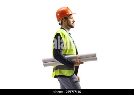 Male site engineer with a safety equipment carrying blueprints isolated on white background Stock Photo