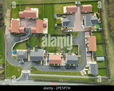 Top down drone view of a small housing development at the edge of an East Anglian village. Both private and affordable housing is located here. Stock Photo