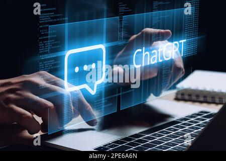 Chatgpt concept. Artificial intelligence. The person uses a laptop and communicates with a neural network. Stock Photo