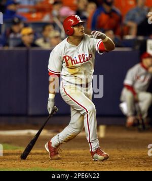 New York Mets' Cliff Floyd watches as fans cheer and bobble a game-winning  walk-off home run ball hit by Philadelphia Phillies' Bobby Abreu in the  ninth inning, Thursday, July 8, 2004, in