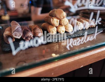 Delicious Cannoli Pastries For Sale In A trendy Cafe, Deli Or Bakery Stock Photo