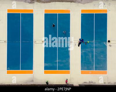 An aerial top view over an empty park with different ball courts for sports and playground areas Stock Photo