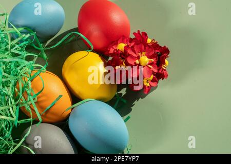 colorful eggs symbolize easter. Easter minimal concept. Creative Happy Easter, spring layout. Stock Photo