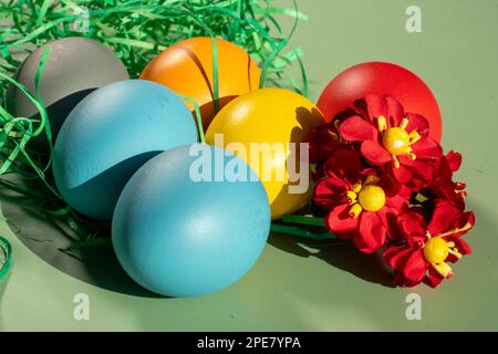 colorful eggs symbolize easter. Easter minimal concept. Creative Happy Easter, spring layout. Stock Photo