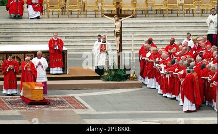 German Cardinal Joseph Ratzinger blesses the casket of Pope John Paul ...