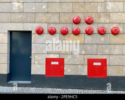 Sprinkler system and fire water supply on the wall of a large property. Concept safety in case of fire. Stock Photo