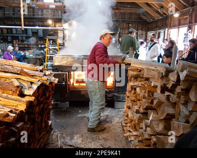 Boiling down maple tree sap to make maple syrup at Goulds Sugar House, now closed. Stock Photo