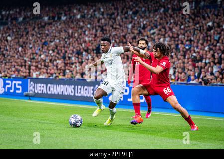 Madrid, Spain. 15th Mar, 2023. Vinicius Junior (Real Madrid) and Trent Alexander-Arnold (Liverpool) in action during the football match betweenReal Madrid and Liverpool valid for the second leg of the round of 16 of the Uefa Championâ&#x80;&#x99;s League celebrated in Madrid, Spain at Bernabeu stadium on Wednesday 15 March 2023 Credit: Independent Photo Agency/Alamy Live News Stock Photo