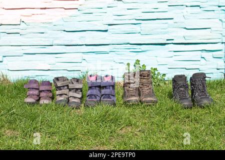 5 pairs of shoes in front Stock Photo