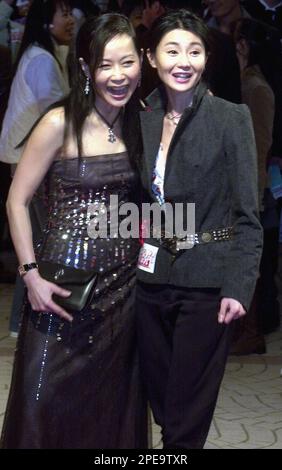 Hong Kong actress Cecilia Yip and her husband Louis Tan pose as they ...