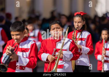 Matamoros, Tamaulipas, Mexico - November 26, 2022: The Desfile del 20 de Noviembre, Marching band performing at the parade Stock Photo