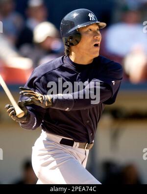 New York Yankees' Hideki Matsui watches his solo home run in the seventh  inning against the Minnesota Twins, Thursday, Sept. 30, 2004, in New York.  The Yankees defeated the Twins, 6-4, to