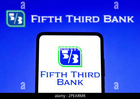 In this photo illustration, the Fifth Third Bank logo seen displayed on a smartphone. Stock Photo