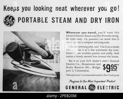 GE General electric portable steam and dry iron advert in a Natgeo magazine June 1956 Stock Photo