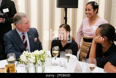 Britain's Prince Charles, left, speaks to young people who have participated in the Prince's Trust courses during a function for the Trust, in Auckland,New Zealand, Wednesday, March 9, 2005. Prince Charles is on a six day visit to New Zealand. (AP Photo/William West, Pool)