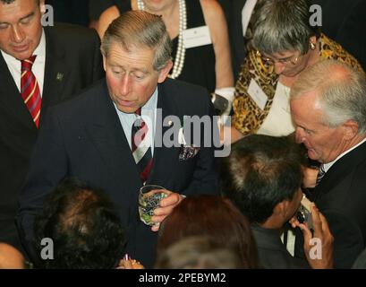 Prince Charles, center, attends a Governor's Reception at the Government House Ballroom during his visit in Perth Tuesday, March 1, 2005. The prince is in Australia for five days visiting Perth, Alice Springs, Melbourne, Sydney and Canberra. (AP Photo/Tony Ashby, POOL)