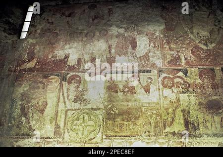 Hunedoara County, Romania, 2002. Old frescoes inside the Calvinist (originally Orthodox) church Sântămăria-Orlea, a historical monument from the 13th century. Stock Photo