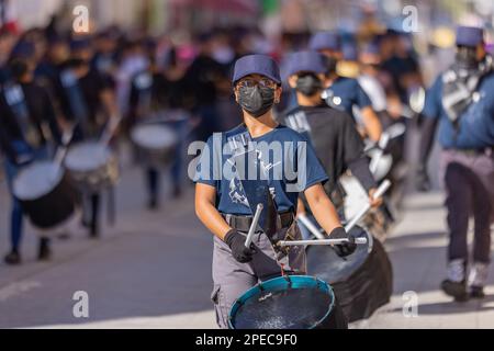 Matamoros, Tamaulipas, Mexico - November 26, 2022: The Desfile del 20 de Noviembre, Marching band performing at the parade Stock Photo