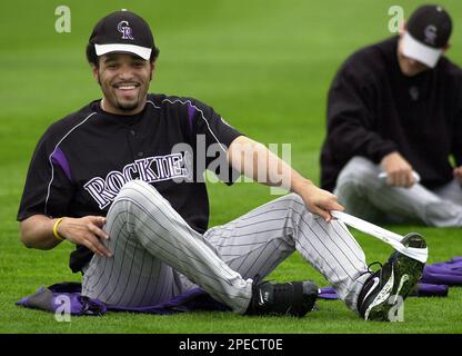 Former Colorado Rockies pitcher Shawn Chacon (facing camera) hugs Rockies'  Luis Gonzalez good-bye in the dugout after Chacon was traded to the New  York Yankees during the sixth inning at Coors Field