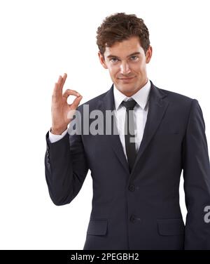 Top notch. Studio shot of a handsome man giving you the ok sign against a  white background Stock Photo - Alamy