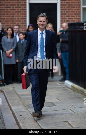 (230316) -- LONDON, March 16, 2023 (Xinhua) -- Chancellor of the Exchequer Jeremy Hunt of the United Kingdom (UK) leaves 11 Downing Street to deliver his budget to Parliament, in London, Britain, on March 15, 2023. UK on Wednesday unveiled a clutch of measures to boost its struggling economy, including childcare reforms, tax cuts for businesses, and policies to ease the cost-of-living burden for households. (Simon Walker/No. 10 Downing Street/Handout via Xinhua) Stock Photo