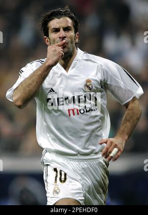 Real Madrid's Portuguese Player Luis Figo Left Battles For The Ball ...