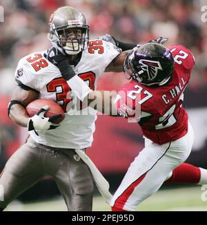 Tampa Bay Buccaneers safety Tanard Jackson (R) hits Seattle