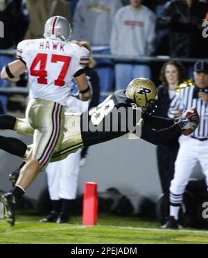 Ohio State linebacker A.J. Hawk (47) celebrates with teammate David  Patterson (97) after sacking Notre Dame quarterback Brady Quinn (10) in the  second half of the Fiesta Bowl college football game, Monday