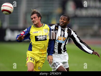 Juventus forward Marcelo Zalayeta, of Uruguay, center, jumps for the ball  as Verona's Vincenzo Italiano, left, and Marco Turati look on during an  Italian second division Serie B soccer match between Juventus