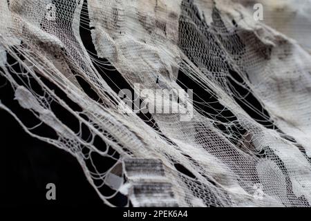 cloth backdrops disintegrating with age and weather Stock Photo