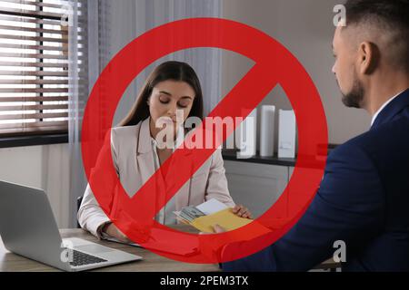 Stop corruption. Illustration of red prohibition sign and man giving bribe to woman at table in office Stock Photo