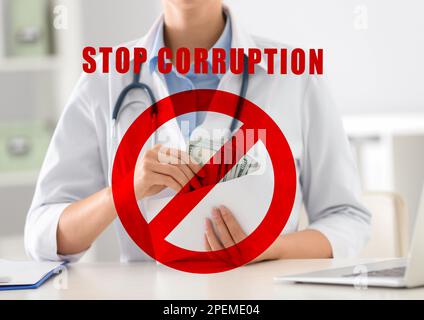 Stop corruption. Illustration of red prohibition sign and doctor with bribe at desk in clinic, closeup Stock Photo