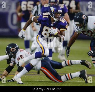 Wide receiver Nate Burleson of the Minnesota Vikings walks on the