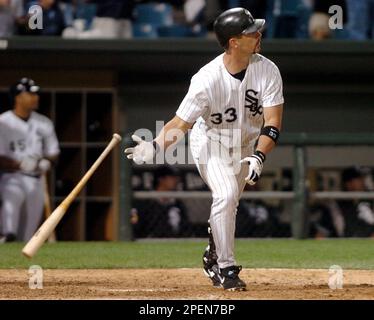 Chicago White Sox's Aaron Rowand drops his bat as he watches his game-tying  two-run homer in the 10th inning against the Detroit Tigers, Saturday,  Sept. 18, 2004, in Chicago. (AP Photo/Jeff Roberson