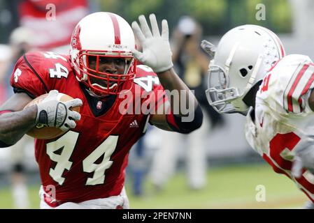 Notre Dame Jeff Samardzija (83) runs after catching a pass then is brought  down by Ohio State's Ashton Youboty (26) in the fourth quarter of the  Fiesta Bowl January 2, 2006 in