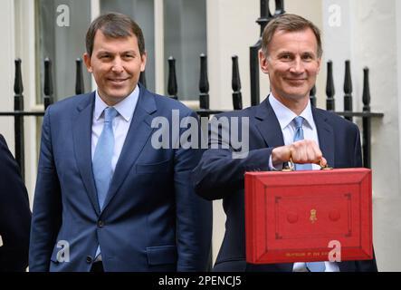 Jeremy Hunt MP (Con: South West Surry) Chancellor of the Exchequer, leaving Downing Street to deliver his first budget, 15th March 2023. With John Gle Stock Photo
