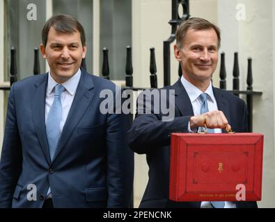 Jeremy Hunt MP (Con: South West Surry) Chancellor of the Exchequer, leaving Downing Street to deliver his first budget, 15th March 2023. With John Gle Stock Photo