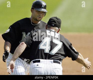 Florida Marlins Alex Gonzalez celebrates with Ugueth Urbina, after Urbina  gets a save against the New York Yankees in game 5 of the 2003 MLB World  Series, at Pro Player Stadium, Miami