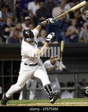 Chicago White Sox's Aaron Rowand drops his bat as he watches his game-tying  two-run homer in the 10th inning against the Detroit Tigers, Saturday,  Sept. 18, 2004, in Chicago. (AP Photo/Jeff Roberson