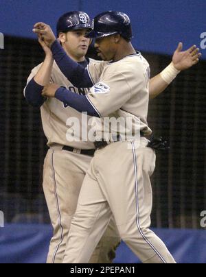Mar 30, 2002; Oakland, CA, USA; San Diego Padres' Pete Incaviglia, #24,  slams into the wall after catching a fly ball hit by Oakland A's Terrence  Long, #12, in the fourth inning