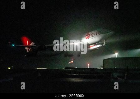 File photo dated 9/1/2023 of a repurposed Virgin Atlantic Boeing 747 aircraft, named Cosmic Girl, carrying Virgin Orbit's LauncherOne rocket, takes off from Spaceport Cornwall at Cornwall Airport, Newquay. Richard Branson's satellite launch firm Virgin Orbit has paused operations, the company said, amid reports that it is working to secure additional funding. The news comes after the company, which is based in California, failed in its first ever satellite mission from UK soil in January. Issue date: Thursday March 16, 2023. Stock Photo